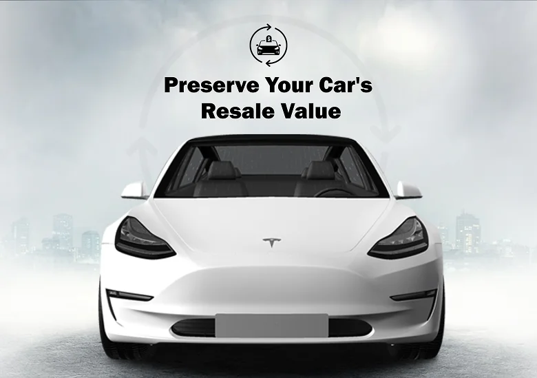 Front view of a white Tesla Model 3 with text above reading “Preserve Your Car's Resale Value” against a foggy cityscape background.