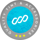 Circular logo for Quality Tint & Accessories featuring a white infinity symbol on a textured blue center, surrounded by a black ring with white text and three yellow stars at the bottom.